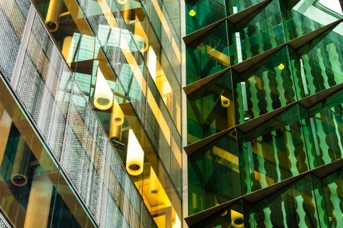 The glass surfaced exterior corner of the TRI building in Brisbane. - Australian Stock Image