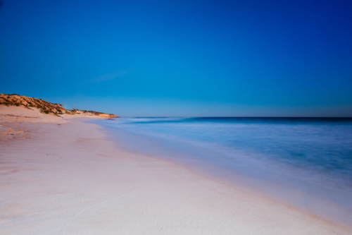 The idyllic Number Sixteen Beach at sunset in Rye, Victoria, Australia - Australian Stock Image