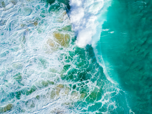 The ocean floor churns under the collapse of crashing waves - Australian Stock Image