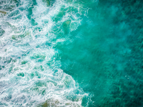 The ocean in disarray as it gathers between crashing waves - Australian Stock Image