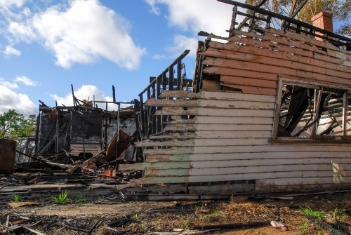 The remains of house fire in regional Victoria - Australian Stock Image