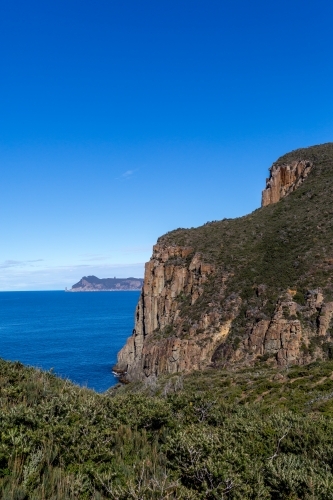 The view from Tasmania's Cape Hauy on the Three Capes Track towards Tasman Island - Australian Stock Image