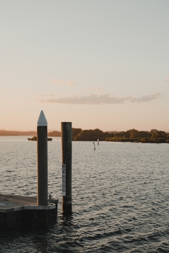 The Yamba Wharf at sunset near the Yamba Marina on the Clarence River. - Australian Stock Image