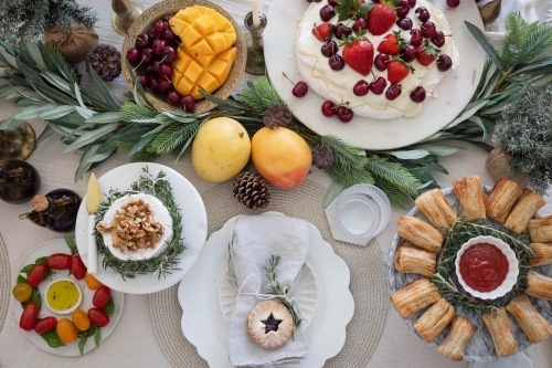 Top-down shot of table prepared for Christmas meal - Australian Stock Image