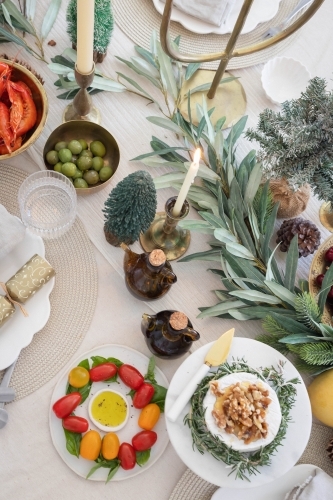 Top-down shot of table prepared for Christmas meal - Australian Stock Image