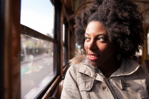 Tourist Riding on the Melbourne Tram - Australian Stock Image