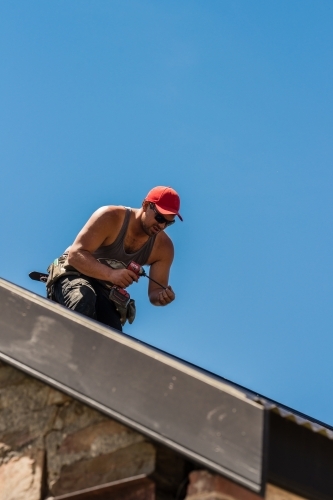 tradie working on the roof - Australian Stock Image