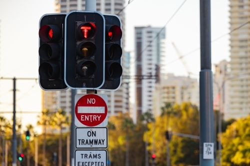 Traffic lights at G:Link light rail tram crossing on the Gold Coast - Australian Stock Image