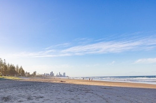 Tranquil beach afternoon with view of the Gold Coast city skyline - Australian Stock Image