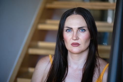 Transgender woman on stairway - Australian Stock Image