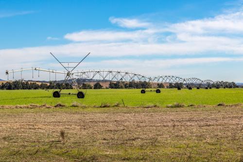Travelling irrigator on paddock - Australian Stock Image