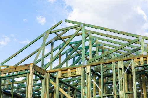 treated timber house frame and roofing framework of a new house - Australian Stock Image