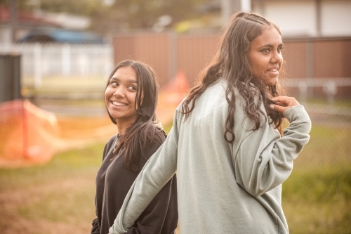 Two Aboriginal girls together outside - Australian Stock Image