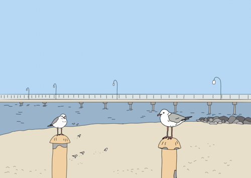Two seagulls perched on posts at beach with blue sky, water and jetty in background - Australian Stock Image