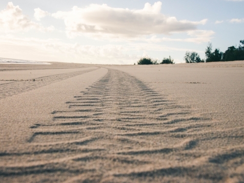 Tyre track in the sand - Australian Stock Image