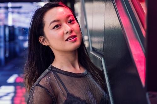 urban portrait, beautiful young Asian woman - Australian Stock Image