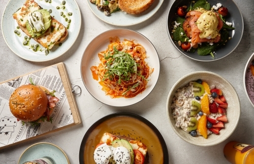 Various food dishes on table - Australian Stock Image