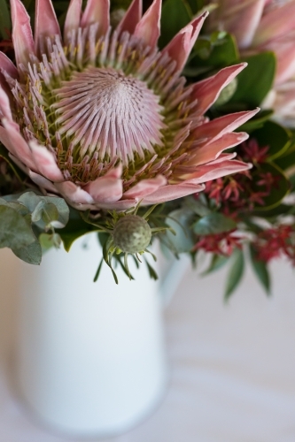 Vase of native flowers at christmas time - Australian Stock Image