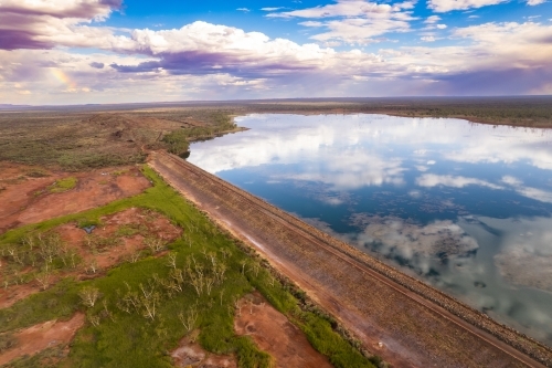 Vast rural landscape with reflective lake - Australian Stock Image