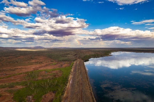 Vast rural landscape with reflective lake - Australian Stock Image