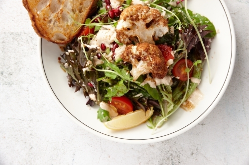 Vegetarian cauliflower salad in bowl - Australian Stock Image