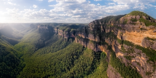 View down the Grose Valley in the NSW Blue Mountains with Mount Banks in foreground - Australian Stock Image