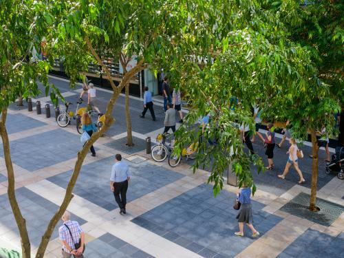 View from above of people and parked bicycles in a mall - Australian Stock Image