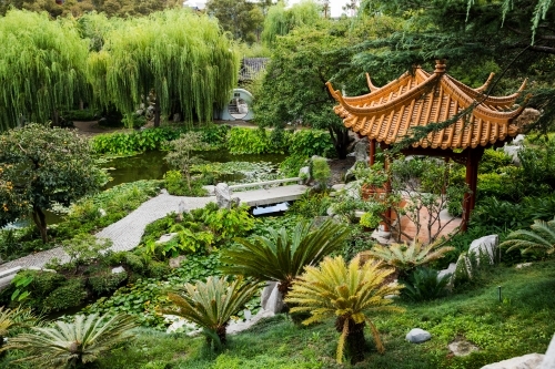 view looking down over gardens and lake - Australian Stock Image