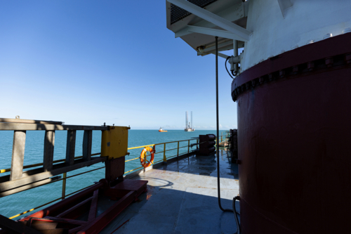 View of drilling rig transfer at sea - Australian Stock Image