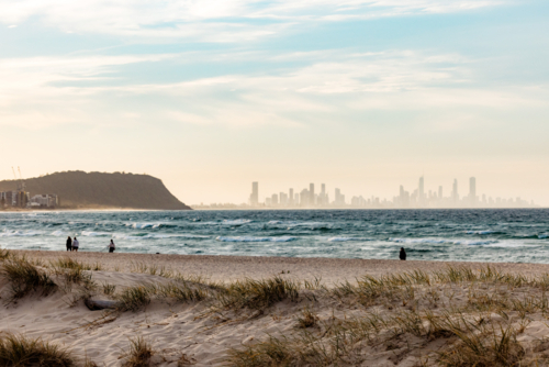 View of Gold Coast skyline across the water from Palm Beach - Australian Stock Image