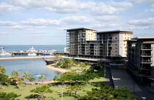 View of waterfront apartments and parkland surrounding Darwin harbour and lagoon - Australian Stock Image