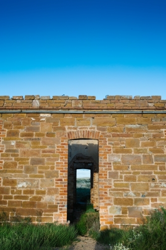 View through doorways of the remains of an outback historical building