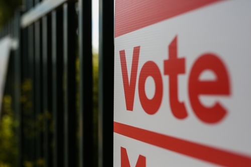 Vote sign outside a polling booth at an election - Australian Stock Image