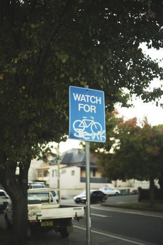 Watching for Bicycles Street Sign - Australian Stock Image