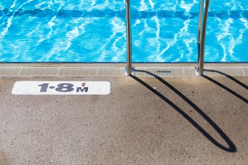 Water ripples in a pool with depth measurement - Australian Stock Image