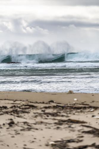 Waves crashing into the shoreline - Australian Stock Image