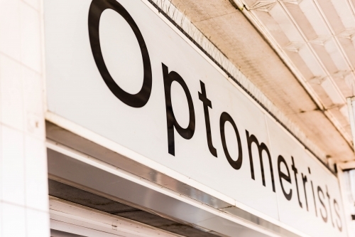 White and black optometrists business sign - Australian Stock Image