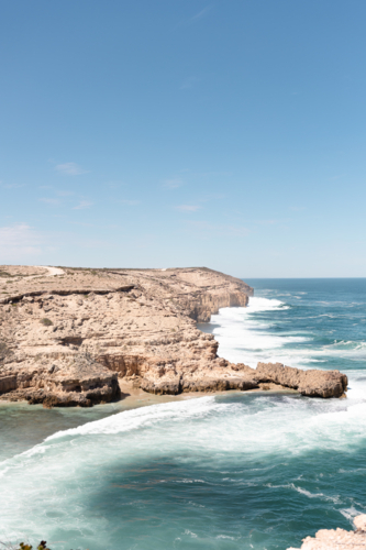 White cliffs and crashing southern ocean along Clifftop Drive Sculpture Trail - Australian Stock Image