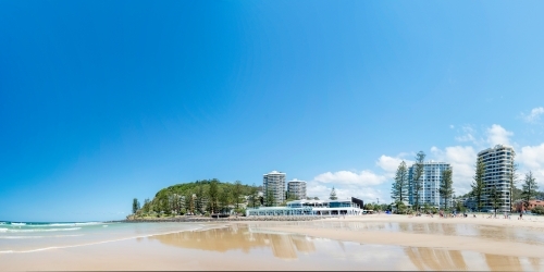 Wide view of sunny day at the Gold Coast beach - Australian Stock Image