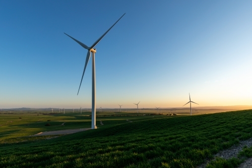 wind turbine with wind farm in background - Australian Stock Image