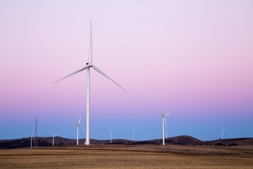 Wind turbines against evening sky - Australian Stock Image