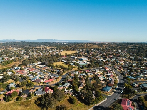 Winter sunlight on houses in residential area of town - Australian Stock Image