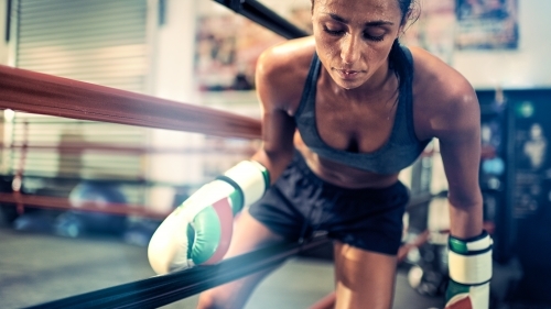 Woman boxing training at gym