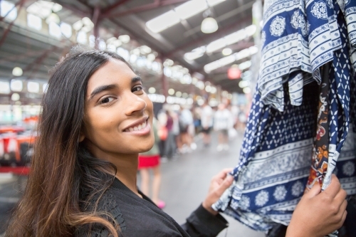 Woman happily shopping at Queen Victoria Market - Australian Stock Image