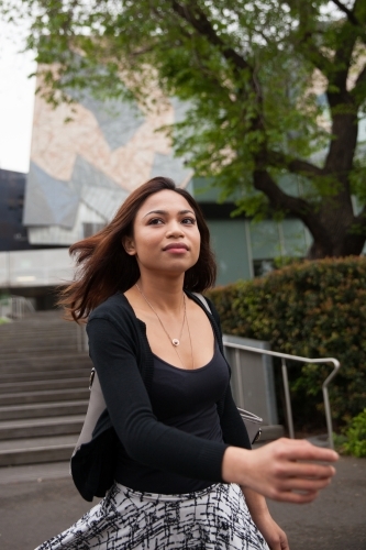 Woman Leaving Federation Square - Australian Stock Image