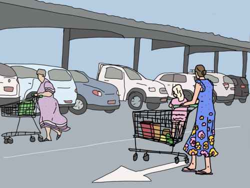 Woman wearing blue floral dress pushing child in trolley with groceries in car park - Australian Stock Image