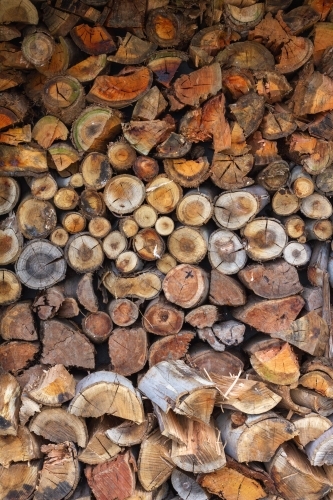 wood logs stacked ready to burn - Australian Stock Image