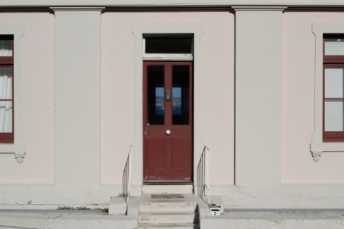 Wooden door with inserted glass panels - Australian Stock Image