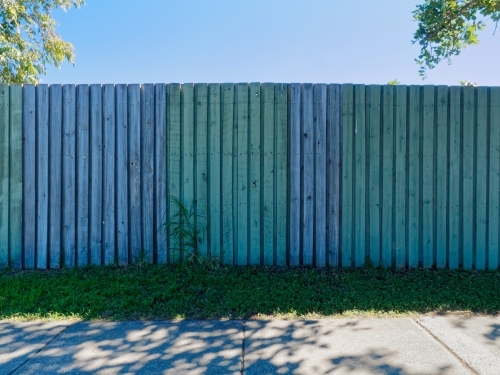 Wooden fence along a pathway - Australian Stock Image