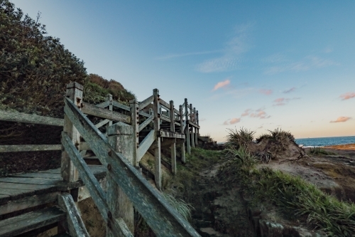 Wooden stairway leading to beach at Norah Head lighthouse, New South Wales Australia - Australian Stock Image